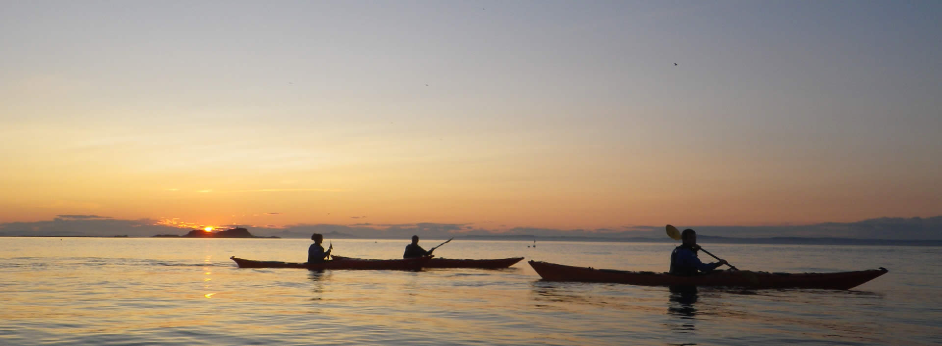 sea kayak evening sunset